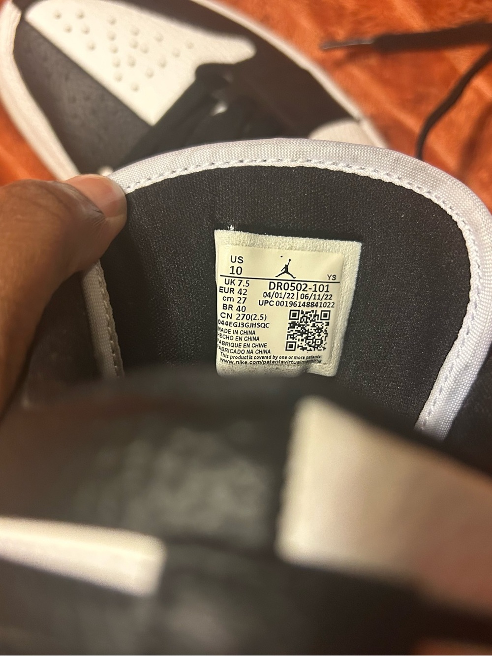 Women’s Black and White Low-Top Jordan 1 Sneakers - Picture 4 of 4